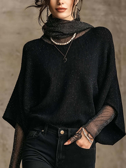 Pull noir en maille brillante