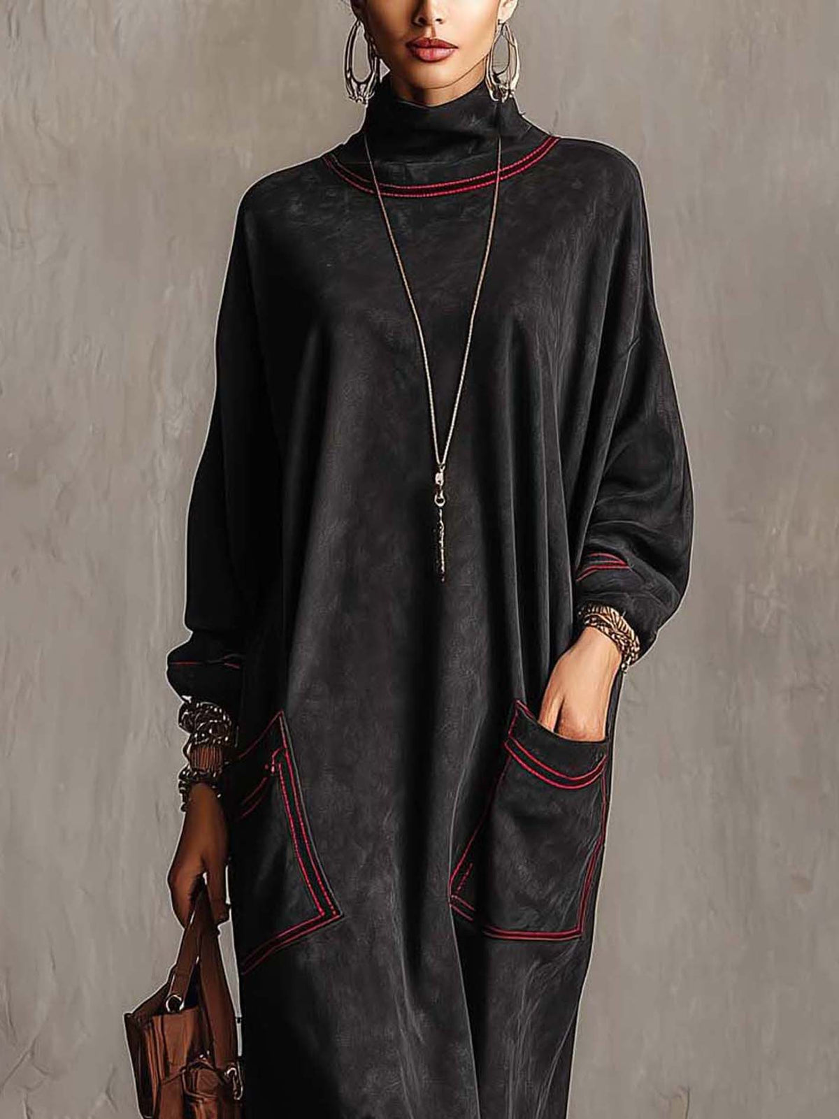 Robe longue en daim noir avec poches