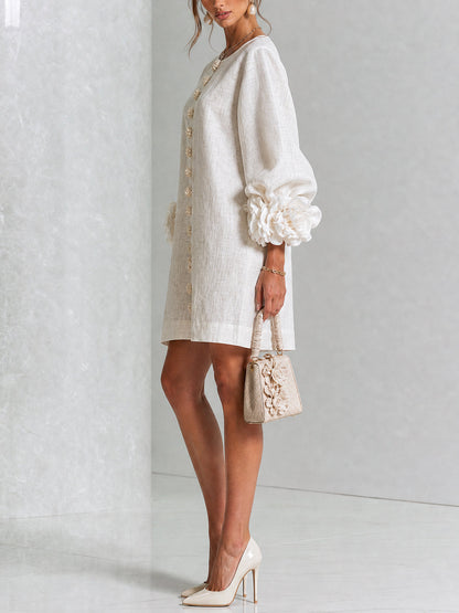 Vestido Mini Henrietta™ mostrando los puños con nudo de rosa