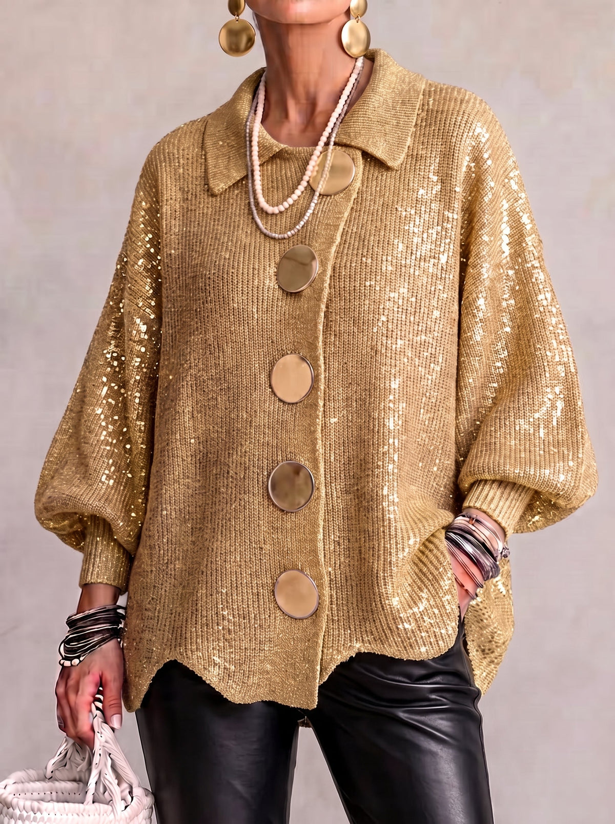 Cárdigan de punto oversize con cuello y botones metálicos grandes